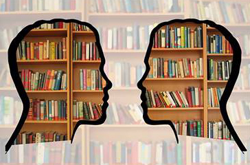 livres humains des bibliothèques dans 2 têtes face à face-Atlaneastro